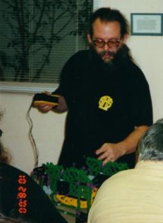 Doug Bell demonstrating a walking robot